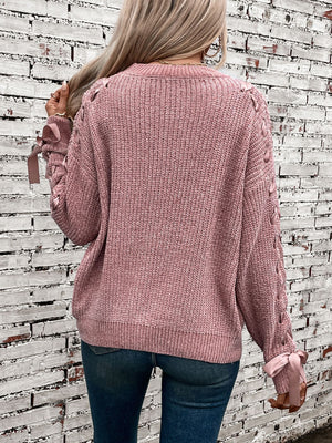 Maglione Invernale Donna – Elegante con Fiocchi sulle Maniche e Dettagli Intrecciati