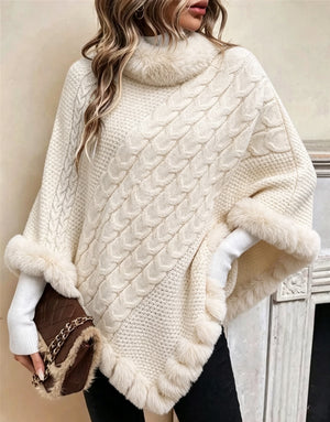 Poncho Donna in Maglia a Trecce con Collo Alto e Bordo Effetto Pelliccia – Eleganza Invernale – Isabella