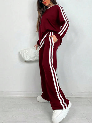 Completo Donna Sportivo con Maglia a Righe e Pantaloni a Gamba Larga – Stile Dinamico e Comfort – Nicole
