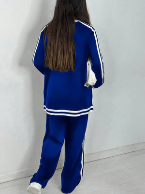 Completo Donna Sportivo con Maglia a Righe e Pantaloni a Gamba Larga – Stile Dinamico e Comfort – Nicole
