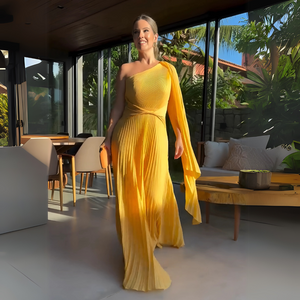 Vestito Lungo Asimmetrico Plissettato – Eleganza con Movimento