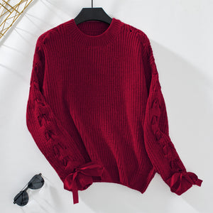 Maglione Invernale Donna – Elegante con Fiocchi sulle Maniche e Dettagli Intrecciati