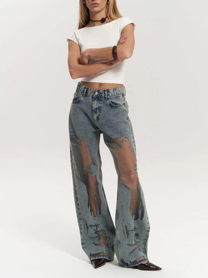 Rebel - Jeans Larghi con Dettagli Trasparenti e Effetto Usura