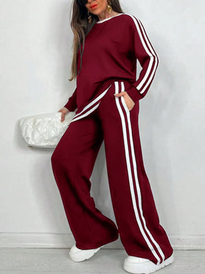 Completo Donna Sportivo con Maglia a Righe e Pantaloni a Gamba Larga – Stile Dinamico e Comfort – Nicole
