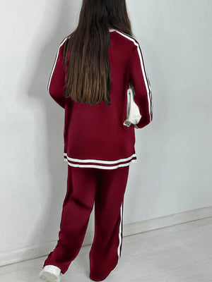 Completo Donna Sportivo con Maglia a Righe e Pantaloni a Gamba Larga – Stile Dinamico e Comfort – Nicole