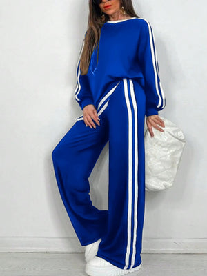 Completo Donna Sportivo con Maglia a Righe e Pantaloni a Gamba Larga – Stile Dinamico e Comfort – Nicole