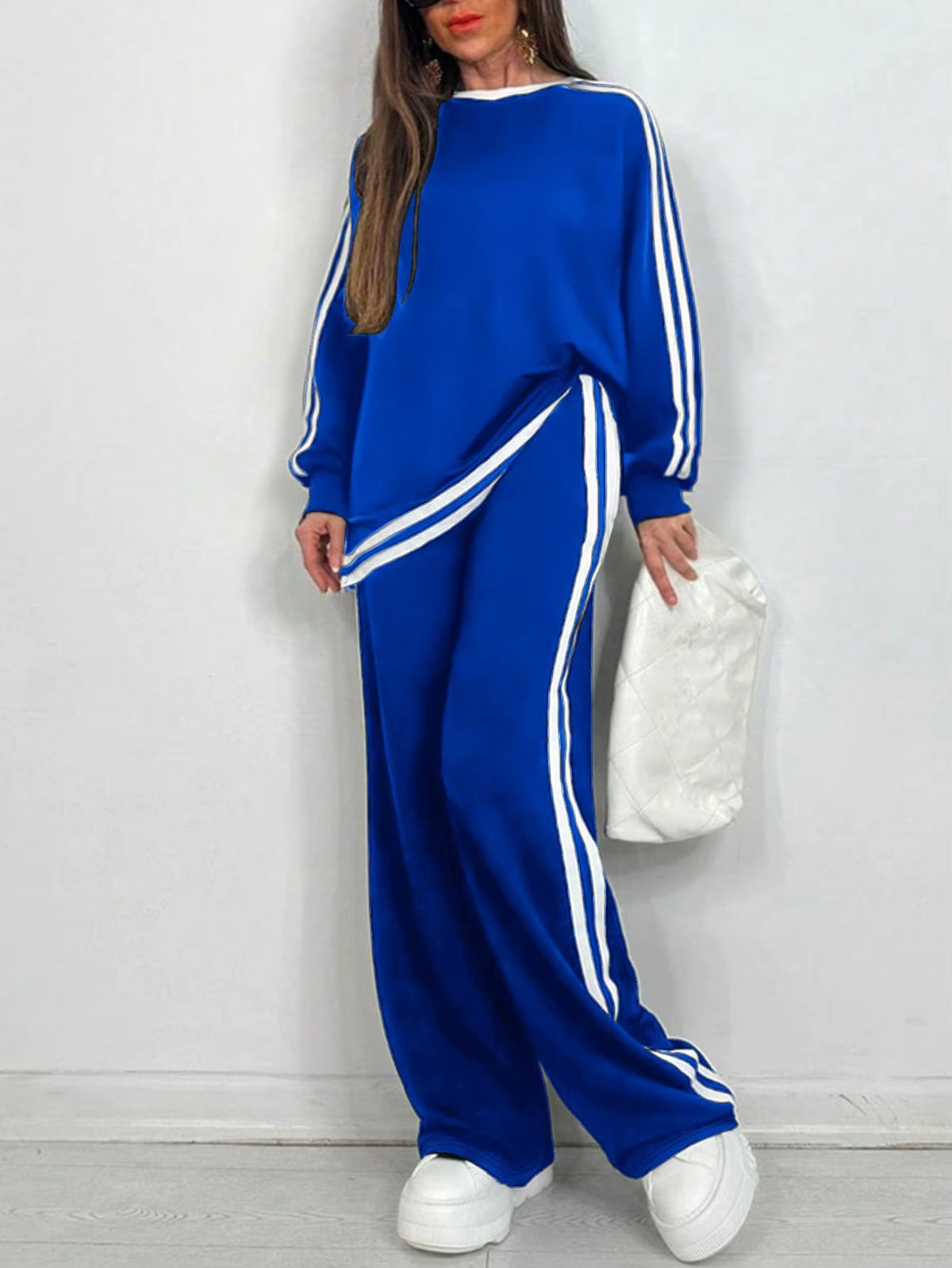Completo Donna Sportivo con Maglia a Righe e Pantaloni a Gamba Larga – Stile Dinamico e Comfort – Nicole