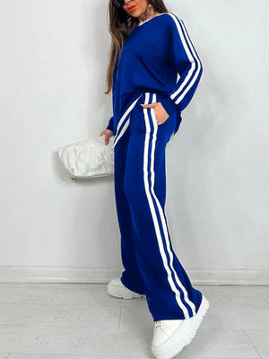 Completo Donna Sportivo con Maglia a Righe e Pantaloni a Gamba Larga – Stile Dinamico e Comfort – Nicole