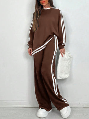Completo Donna Sportivo con Maglia a Righe e Pantaloni a Gamba Larga – Stile Dinamico e Comfort – Nicole